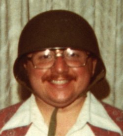 Dick wearing a stupid helmet